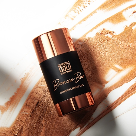 Dripping Gold Luxury Tanning Bronze Bar rozjasňující bronzer na obličej a tělo