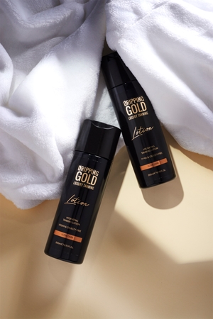 Dripping Gold Luxury Tanning Lotion kosteuttava itseruskettava maito voimakkaaseen rusketukseen