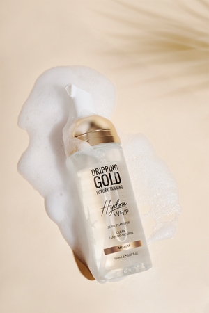 Dripping Gold Luxury Tanning Hydra Whip mousse autoabbronzante trasparente per corpo e viso