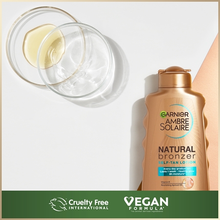Garnier Ambre Solaire Natural Bronzer tönende Lotion für allmähliche Bräunung