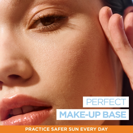 Garnier Ambre Solaire Super UV lozione protettiva ultra leggera contro le imperfezioni della pelle