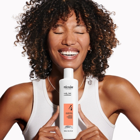 Nioxin System 4 Scalp + Hair Conditioner feuchtigkeitsspendender und nährender Conditioner für gefärbtes und geschädigtes Haar