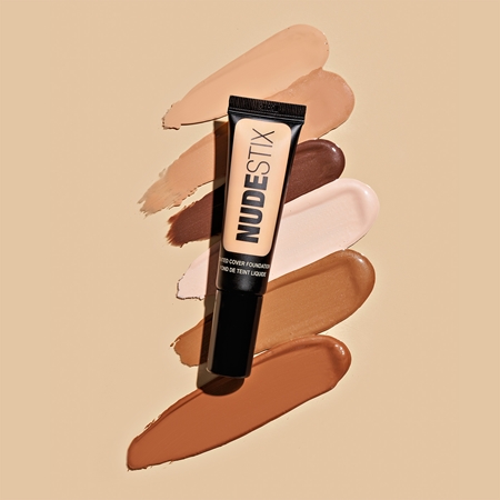 Nudestix Tinted Cover lengvos tekstūros šviesinamojo poveikio makiažo pagrindas natūraliai išvaizdai