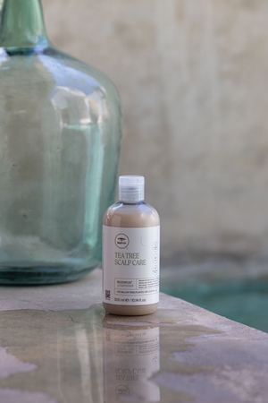 Paul Mitchell Tea Tree Scalp Care Conditioner to treat thinning hair