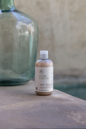 Paul Mitchell Tea Tree Scalp Care Shampoo to treat thinning hair
