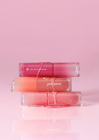 peripera Ink Mood Glowy Tint brillo de labios aportando brillo e hidratación