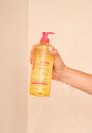 Topicrem UH BODY Shower Oil huile nettoyante hydratante pour peaux sèches et sensibles