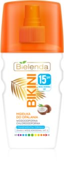 Bielenda Bikini Coconut Caurspīdīgs un izsmidzināms sauļošanās aizsarglīdzeklis SPF 15