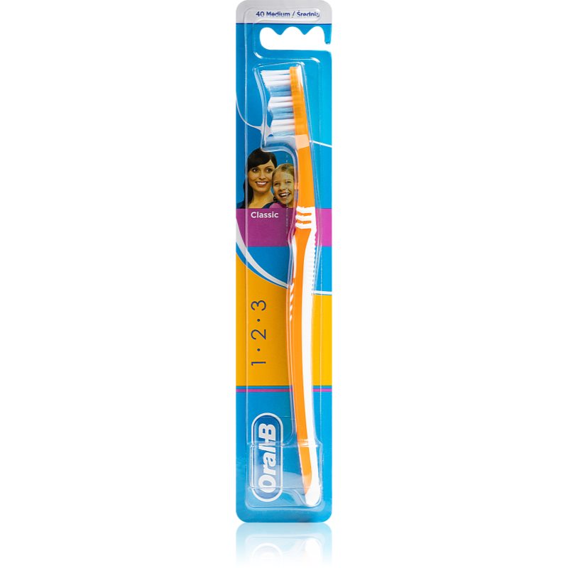 

Oral B 1-2-3 Classic CareClassic Care зубна щітка середньої жорсткості Orange