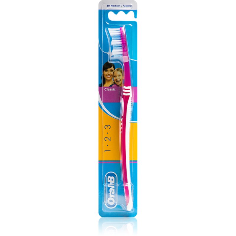 

Oral B 1-2-3 Classic CareClassic Care зубна щітка середньої жорсткості Pink