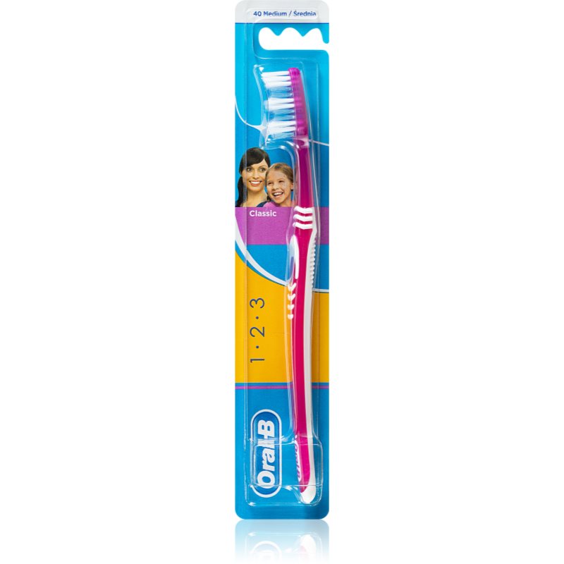 

Oral B 1-2-3 Classic CareClassic Care зубна щітка середньої жорсткості Purple