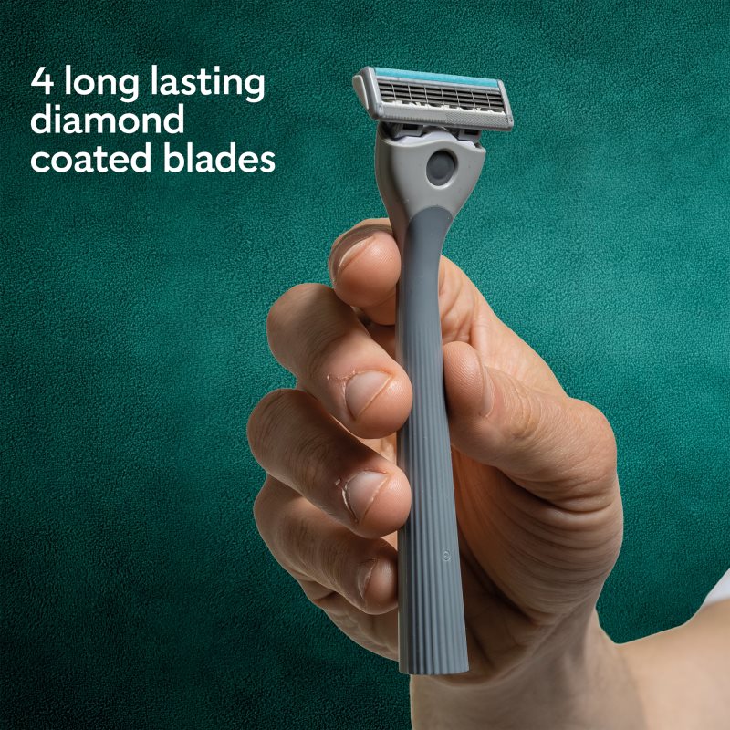 Wilkinson Sword Quattro holiaci strojček náhradné čepieľky 8 ks