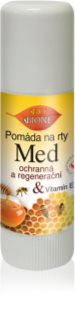 Bione Cosmetics Honey + Q10 pomada regeneradora y protectora para labios con vitamina E 11 ml